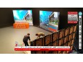 تلویزیون شهری با تصاویر متحرک در غرفه نمایشگاهی جایگزین لایت باکس و بنر ثابت - تصاویر سه بعدی
