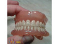 AD is: لابراتوار دندانسازی