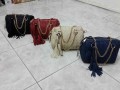  کیف چرمی در انواع رنگ های مختلف : صورتی - قرمز - آبی - مشکی  - قهوه ای  - نمک صورتی